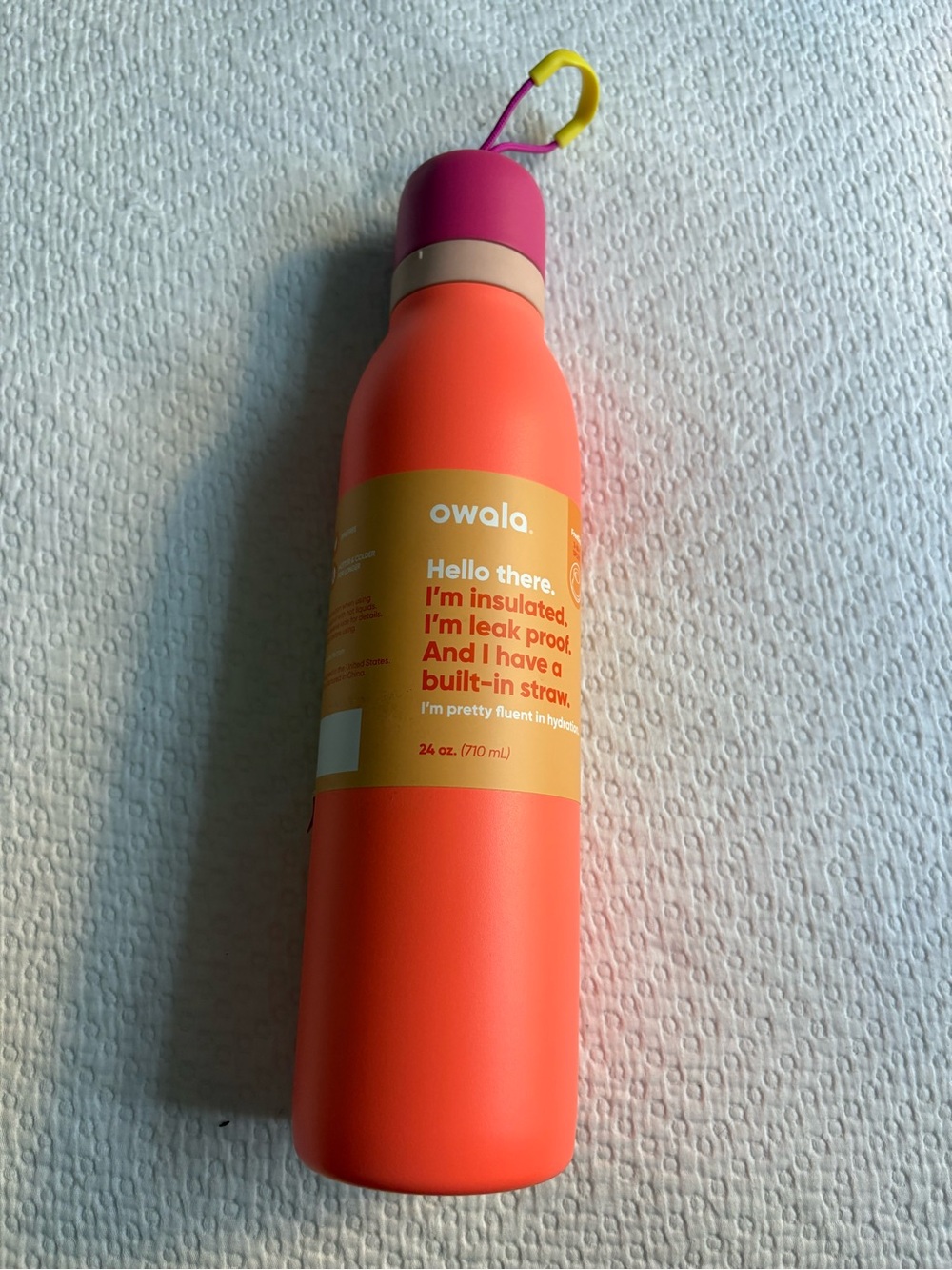 Owala Insulated Water Bottle in Coral with Pink Cap